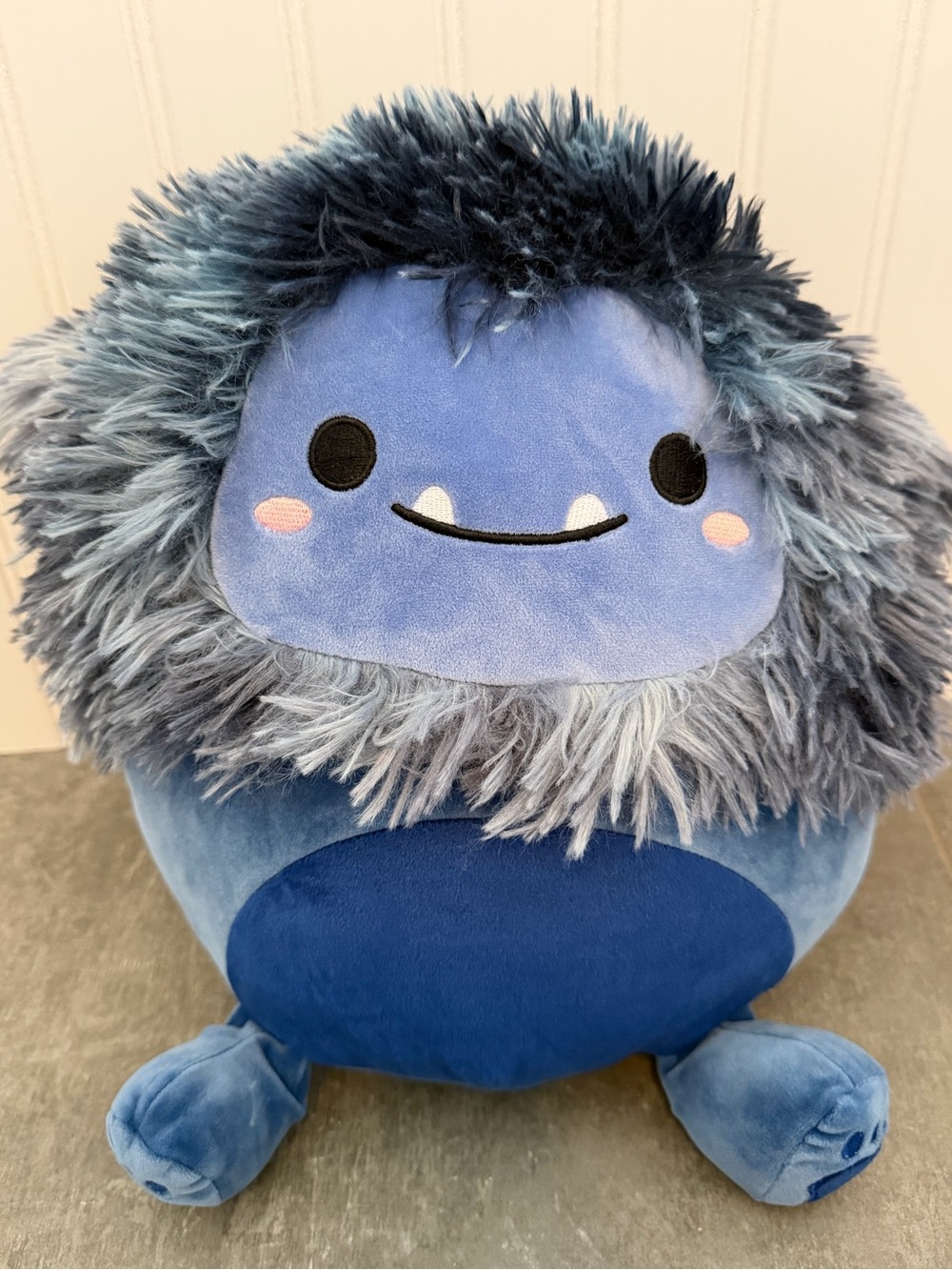 Dani the Navy Blue Bigfoot from the Squishmallows Fantasy Squad.